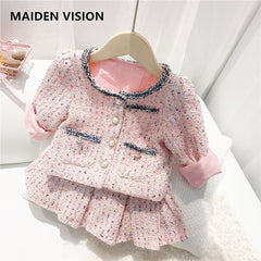 Elegant winter sweater paired with a stylish tulle dress, perfect for seasonal fashion ensembles.