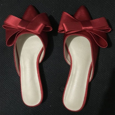 Elegant slippers designed for comfort and style, perfect for any sophisticated wardrobe.