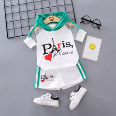 Stylish summer outfits for kids, featuring tailored suits suitable for warm weather occasions.