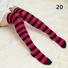 Elegant style striped stockings accentuating sophisticated fashion choices.