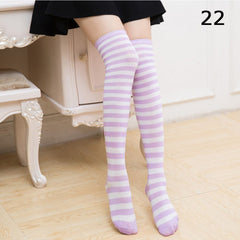 Elegant style striped stockings accentuating sophisticated fashion choices.
