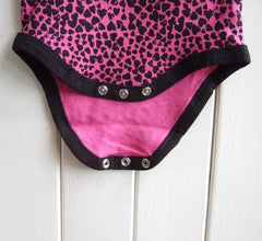 Skull design clothing set for kids girls, featuring stylish and trendy outfits in vibrant colors.