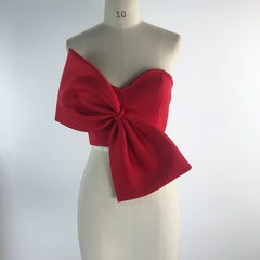 Solid color sexy bow detail on elegant dress, enhancing style and sophistication for fashionable outfits.