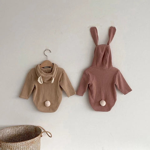 Infant girls’ bodysuit with bunny ear design, perfect for stylish and adorable baby outfits.