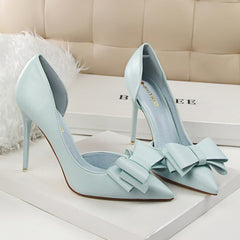 A pair of elegant stiletto heels showcasing refined design and sophistication for formal occasions.