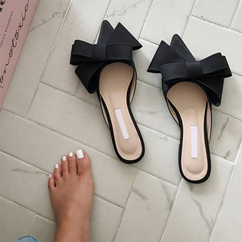 Elegant slippers designed for comfort and style, perfect for any sophisticated wardrobe.