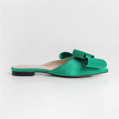 Elegant slippers designed for comfort and style, perfect for any sophisticated wardrobe.