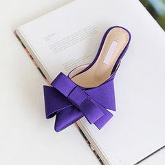 Elegant slippers designed for comfort and style, perfect for any sophisticated wardrobe.