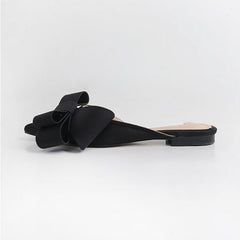 Elegant slippers designed for comfort and style, perfect for any sophisticated wardrobe.
