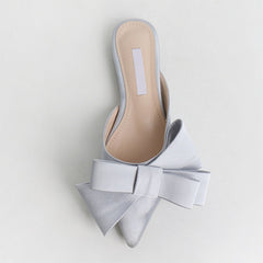Elegant slippers designed for comfort and style, perfect for any sophisticated wardrobe.
