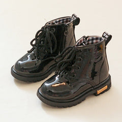 Children's sturdy boots designed for comfort and durability in outdoor adventures.