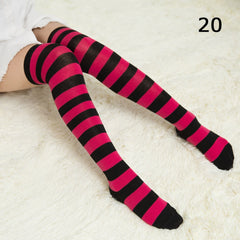 Elegant style striped stockings accentuating sophisticated fashion choices.