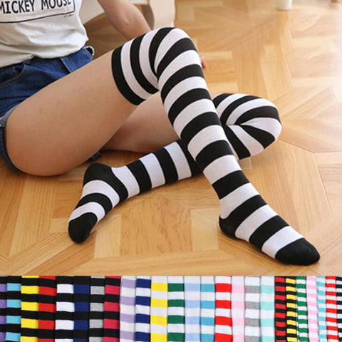 Elegant style striped stockings accentuating sophisticated fashion choices.
