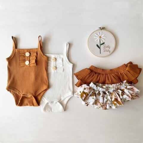 Elegant floral patterns adorn this children's wear, perfect for stylish and comfortable outfits for kids.