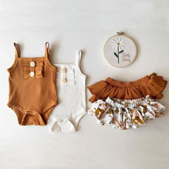 Elegant floral patterns adorn this children's wear, perfect for stylish and comfortable outfits for kids.