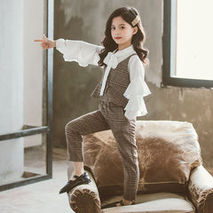 Stylish clothing collection for teen girls featuring trendy outfits and accessories.