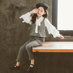 Stylish clothing collection for teen girls featuring trendy outfits and accessories.