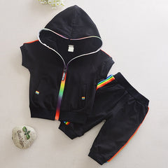 Stylish summer outfits for kids, featuring tailored suits suitable for warm weather occasions.
