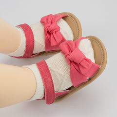 Stylish baby sandals designed for ultimate comfort and support during warm weather outings.