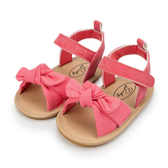 Stylish baby sandals designed for ultimate comfort and support during warm weather outings.