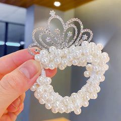 Elegant pearl crown showcasing exquisite fashion design and craftsmanship, perfect for regal occasions.