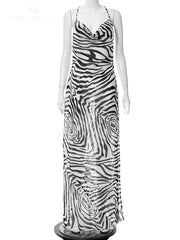 Elegant spaghetti strap beach dress, perfect for summer outings and seaside vacations.