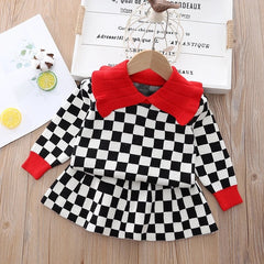 Elegant winter sweater paired with a stylish tulle dress, perfect for seasonal fashion ensembles.