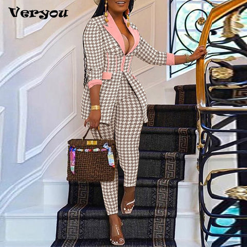 Elegant houndstooth blazer showcasing timeless fashion for sophisticated dressing in any occasion.