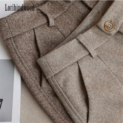 Luxurious woolen fabric showcasing elegant textures and rich colors in a refined setting.