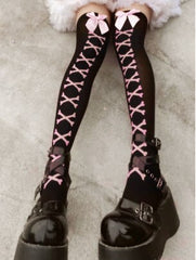Goth fishnet tights featuring intricate patterns, perfect for adding an edgy flair to any outfit.