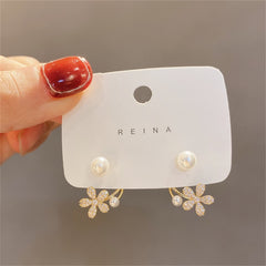 Elegant metal earrings featuring a modern design, perfect for enhancing any formal attire.