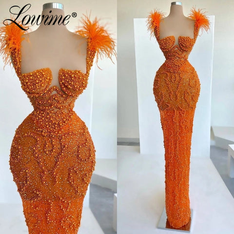 Elegant orange evening dresses designed for formal occasions, combining style and sophistication.