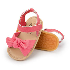 Stylish baby sandals designed for ultimate comfort and support during warm weather outings.