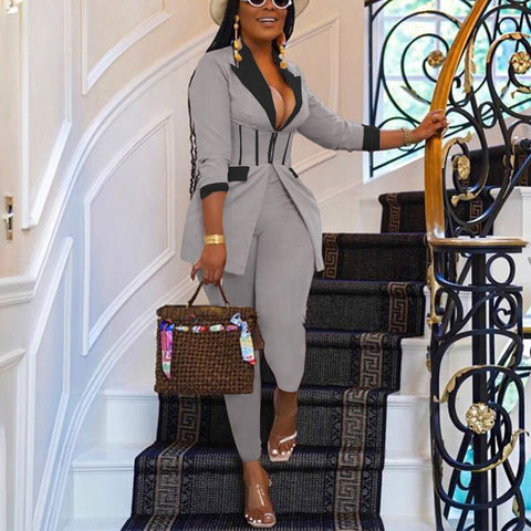 Elegant houndstooth blazer showcasing timeless fashion for sophisticated dressing in any occasion.