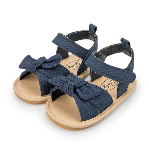 Stylish baby sandals designed for ultimate comfort and support during warm weather outings.