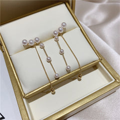 Elegant metal earrings featuring a modern design, perfect for enhancing any formal attire.