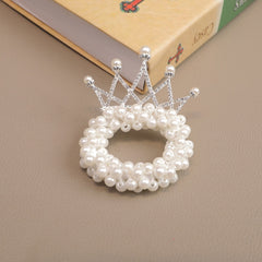 Elegant pearl crown showcasing exquisite fashion design and craftsmanship, perfect for regal occasions.