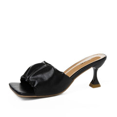 Elegant luxurious high heels showcased in a chic display, perfect for sophisticated occasions and formal events.