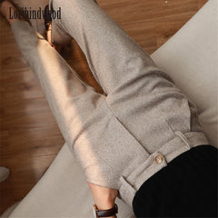 Luxurious woolen fabric showcasing elegant textures and rich colors in a refined setting.