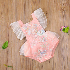 Elegant ruffle sleeve blouse featuring intricate floral embroidery for a sophisticated look.
