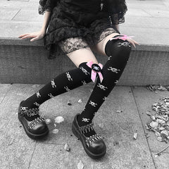 Goth fishnet tights featuring intricate patterns, perfect for adding an edgy flair to any outfit.