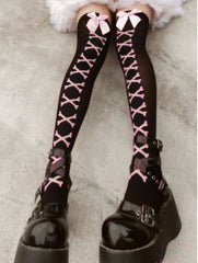 Goth fishnet tights featuring intricate patterns, perfect for adding an edgy flair to any outfit.