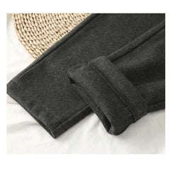 Luxurious woolen fabric showcasing elegant textures and rich colors in a refined setting.