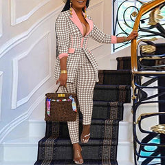 Elegant houndstooth blazer showcasing timeless fashion for sophisticated dressing in any occasion.