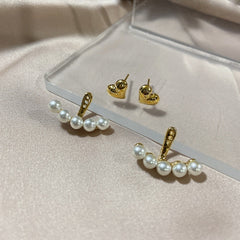 Elegant metal earrings featuring a modern design, perfect for enhancing any formal attire.