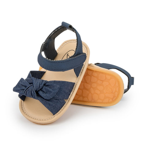 Stylish baby sandals designed for ultimate comfort and support during warm weather outings.