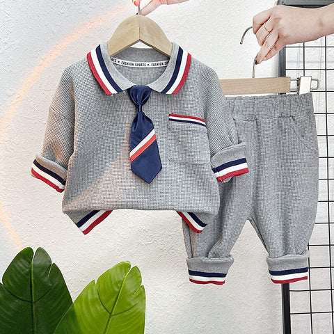 Stylish boys' suit designed for formal occasions, enhancing elegance and sophistication.